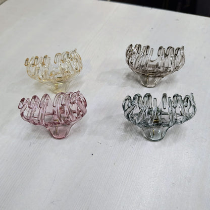 Large claw clip for thick hair in pink, beige, gray, and green translucent colors
