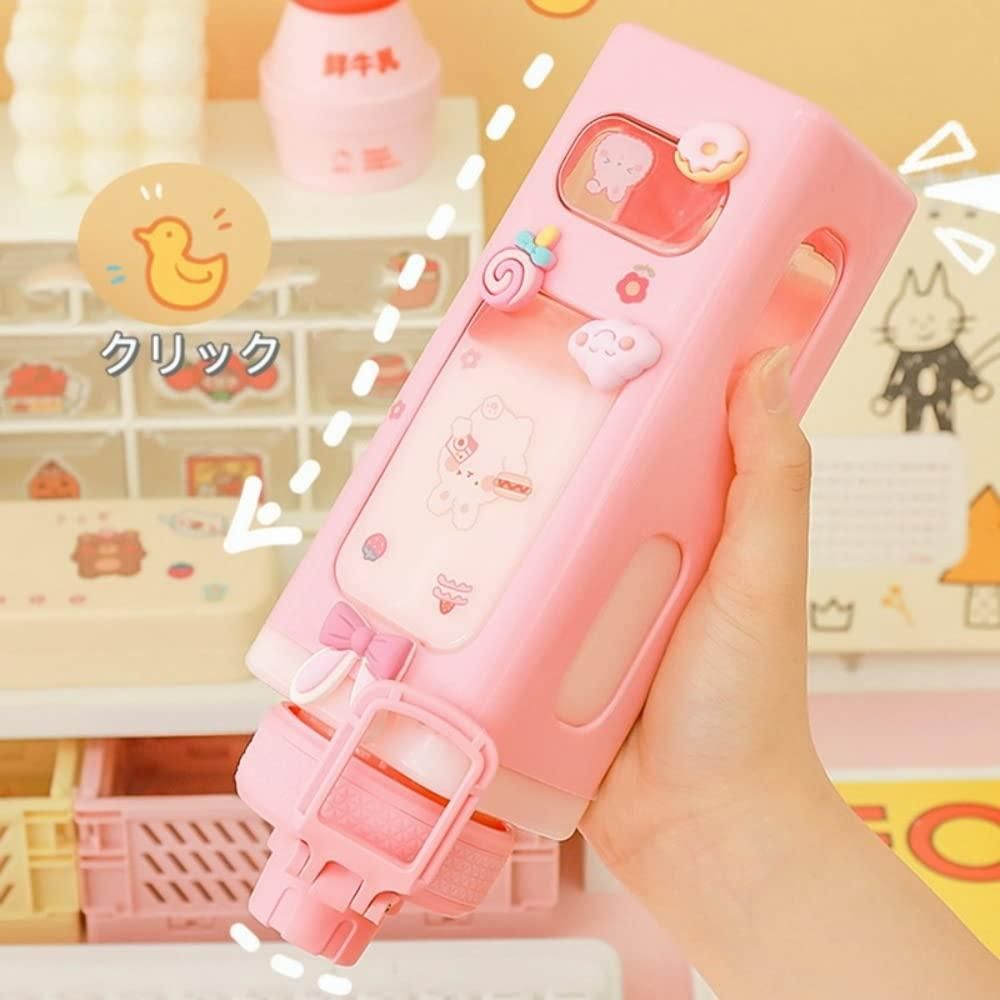 Leakproof kawaii bottle with lid in pink featuring cute dessert and animal decorations