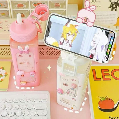 Leakproof kawaii bottle with lid in pink and white featuring adorable bunny design and phone holder function
