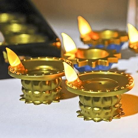Decorative LED water pouring diya light in gold with flickering flames for festive occasions