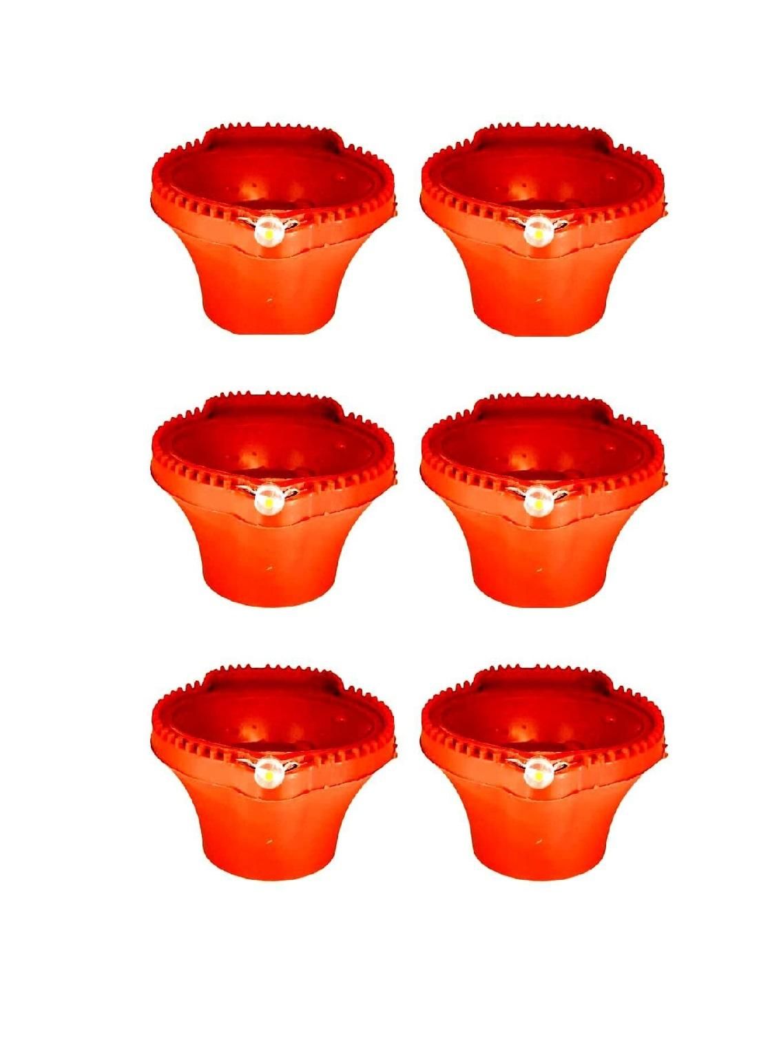 Set of six LED water sensor diyas in vibrant red for festive lighting and home decor