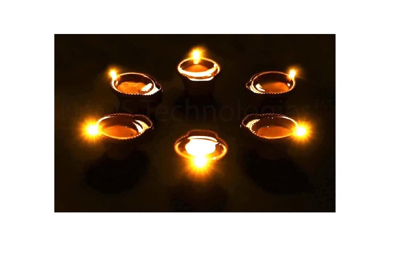 Six LED water sensor diyas glowing brightly, perfect for festive decorations and ambiance