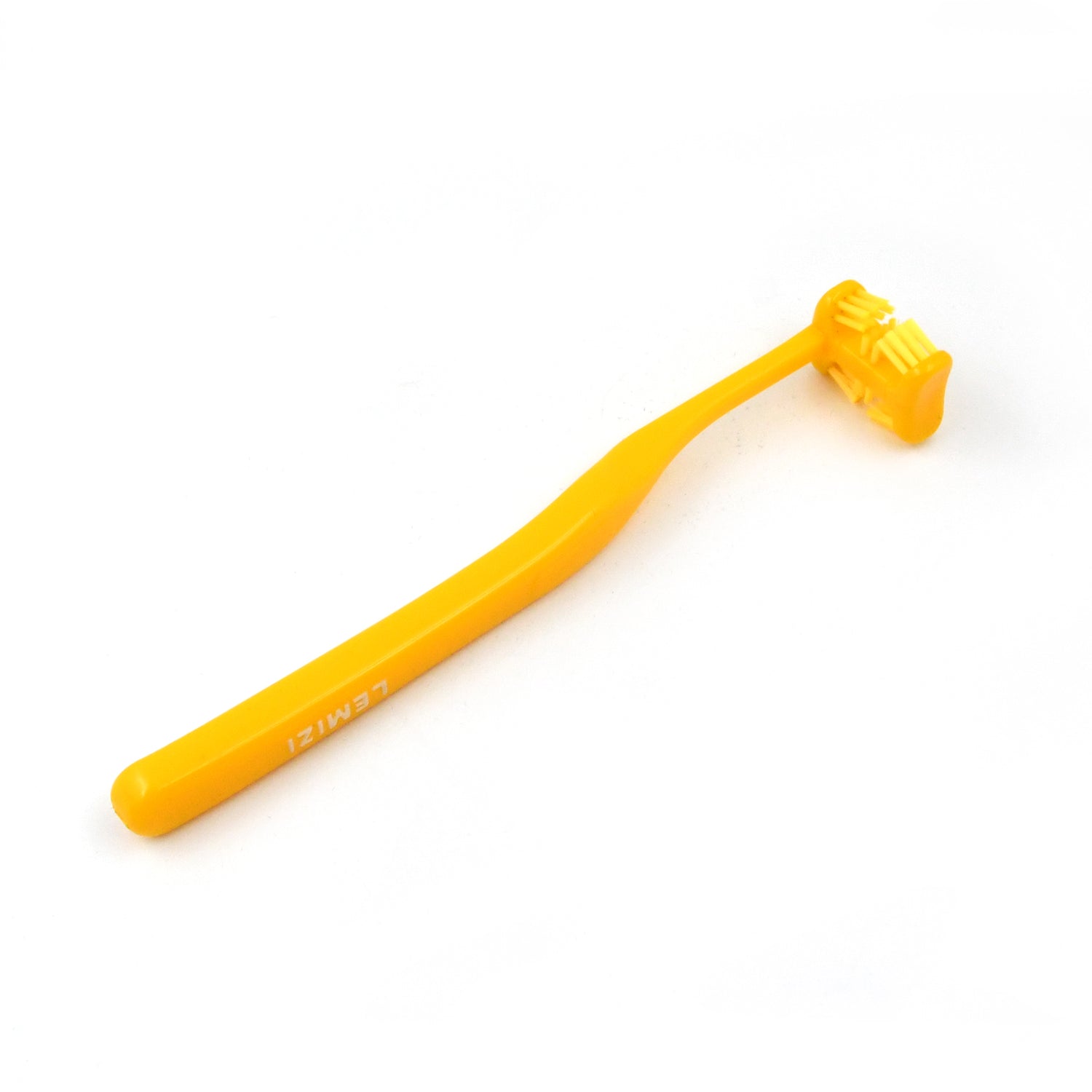 Bright yellow six sided soft toothbrush with ergonomic handle for gentle cleaning of teeth