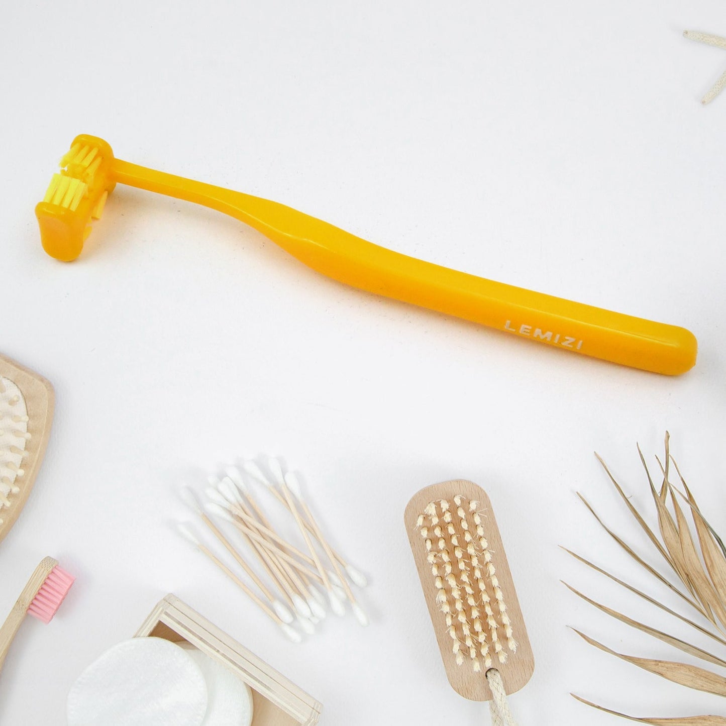 Your Brand six sided soft toothbrush in yellow with ergonomic handle for effective cleaning