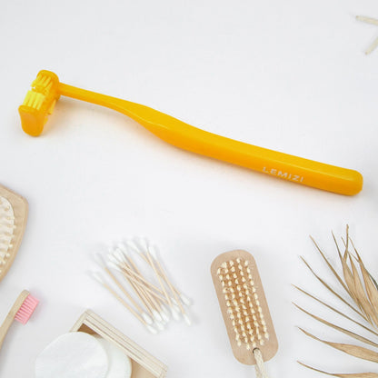Your Brand six sided soft toothbrush in yellow with ergonomic handle for effective cleaning