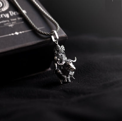 Lord Shiva silver pendant featuring intricate design with a bull motif on a sleek chain