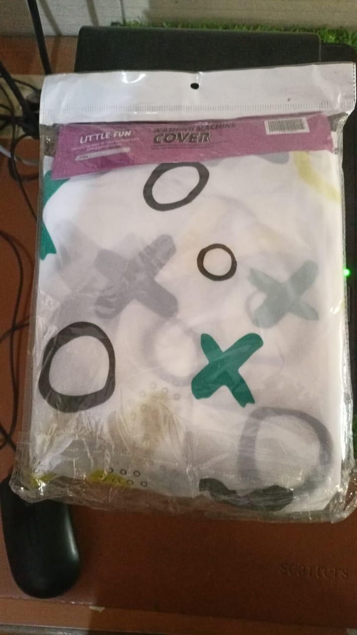 THE GIR FARMER machine cover for laundry room with white fabric and green black and gray playful circle and cross patterns
