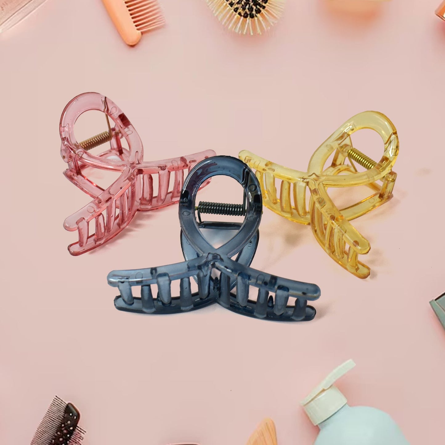 Set of three matte hair barrette clamps in pink, yellow, and blue for stylish hair management