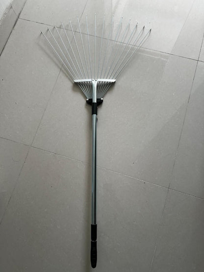 THE GIR FARMER metal yard rake for lawn care with long handle and wide metal tines on tiled floor