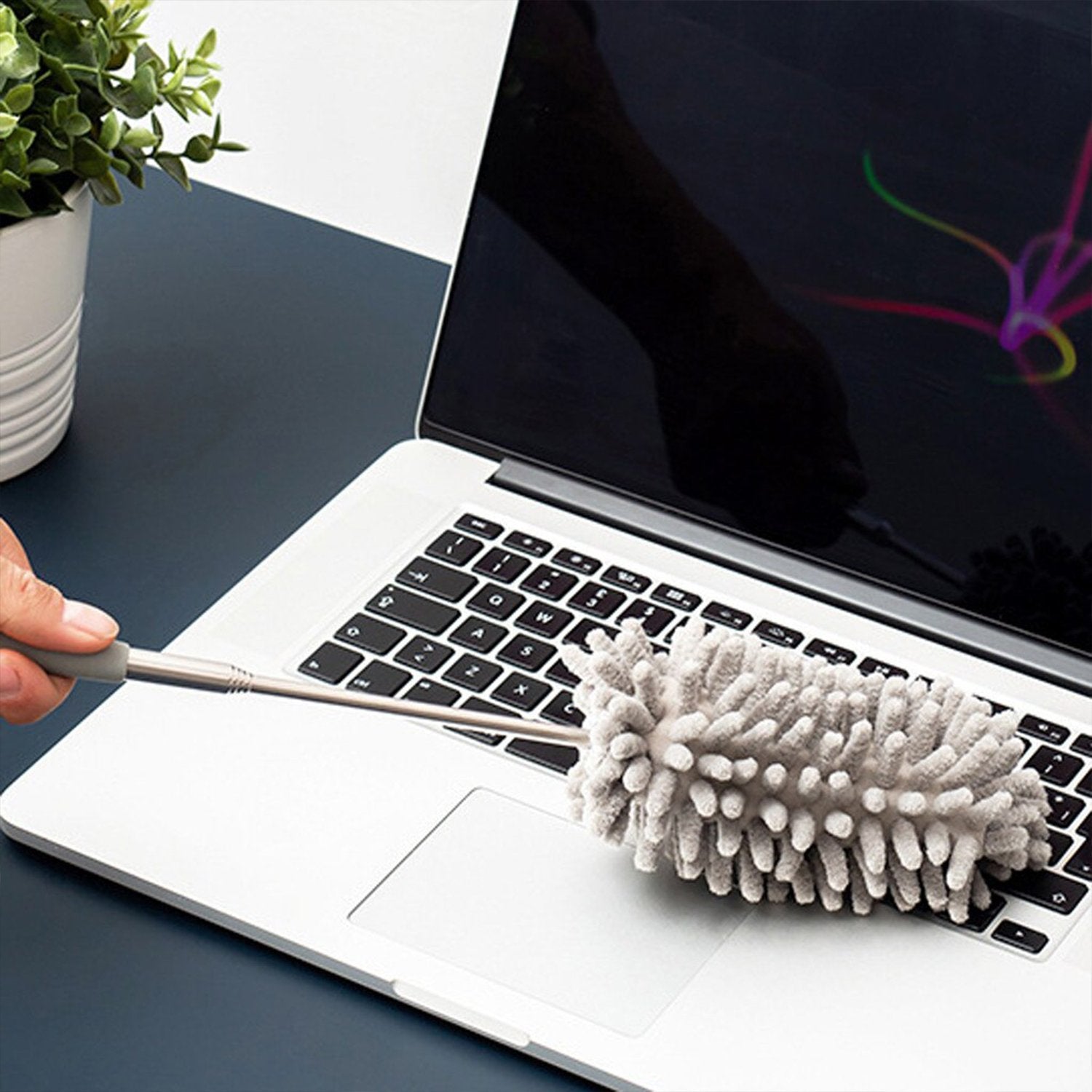 Microfiber fan cleaning duster with flexible handle for effective dust removal from electronics and surfaces