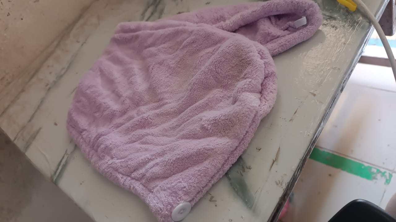Soft lavender microfiber hair drying towel designed for quick and efficient hair drying after a shower