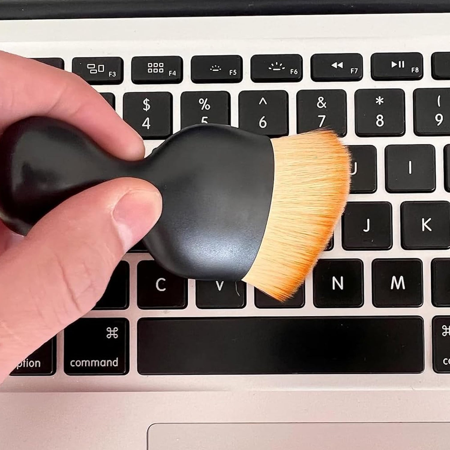 Ergonomic mini car interior cleaning brush with soft bristles for effective dust removal