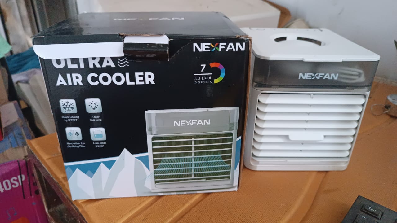 NexFan mini portable air cooler with LED lights and compact design for personal cooling