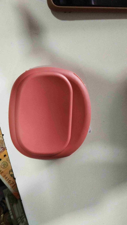 THE GIR FARMER pink mini silicone earbud holder designed to keep earbuds secure and tangle-free