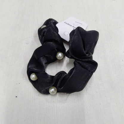 Black mulberry silk scrunchies with pearl accents by Amd DeoDap on white background