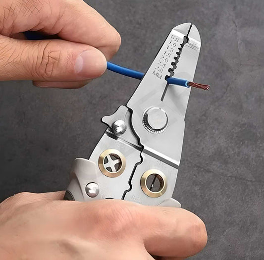The Gir Farmer multi function wire stripper tool removing insulation from a blue wire with precision