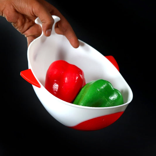 Your Brand multi-purpose washing bowl with strainer in red and white, holding green and red bell peppers