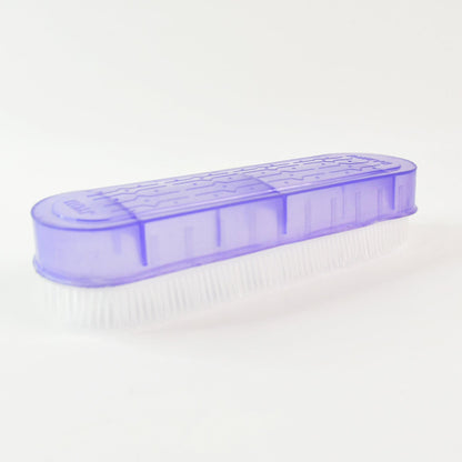 Multipurpose laundry brush with ergonomic grip designed for effective cleaning and stain removal