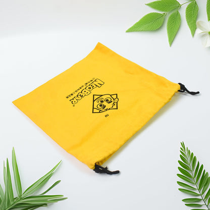Heavy duty small dori bag in bright yellow with a fun logo for versatile use