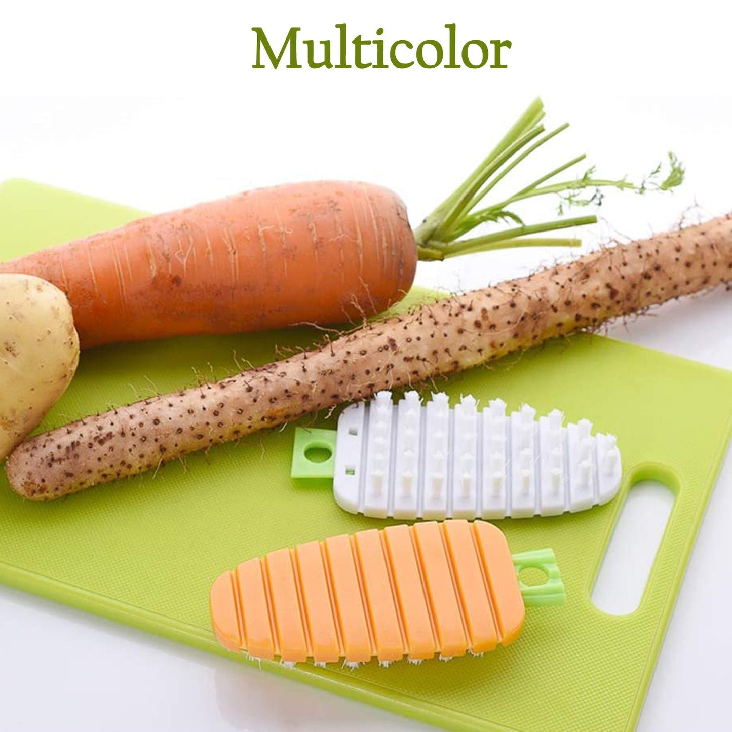 Non-toxic vegetable scrubbing brush next to fresh carrots and potatoes on a cutting board