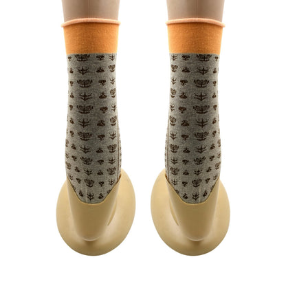 Organic breathable socks with a floral pattern in gray and orange for comfortable everyday wear