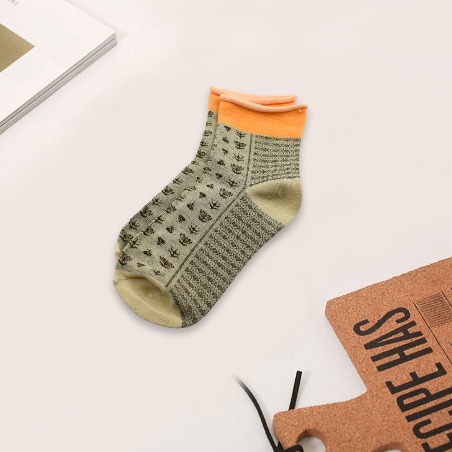 Organic breathable socks in olive green with orange accents for comfortable daily wear