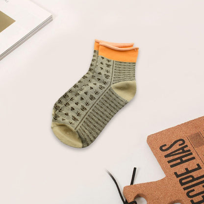 Organic breathable socks in olive green with orange accents for comfortable daily wear