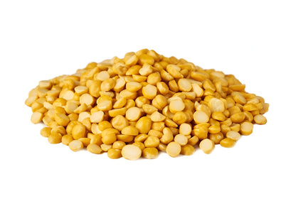 Pile of yellow organic chana dal split chickpeas from THE GIR FARMER on white background