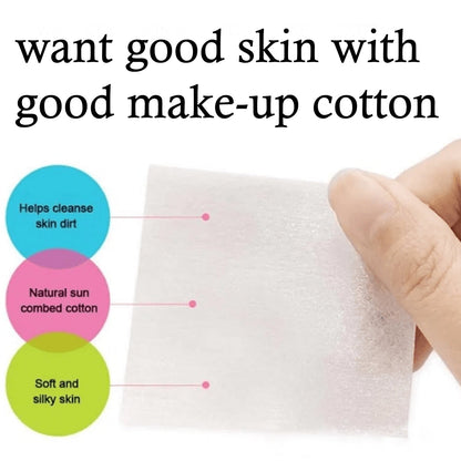 Hand holding organic cotton makeup remover pads for gentle skin cleansing and makeup removal