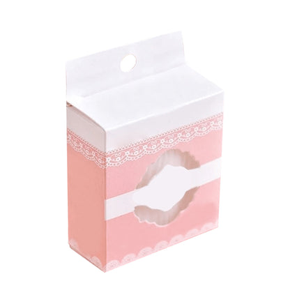 Pink packaging box for organic cotton makeup remover pads with a decorative design