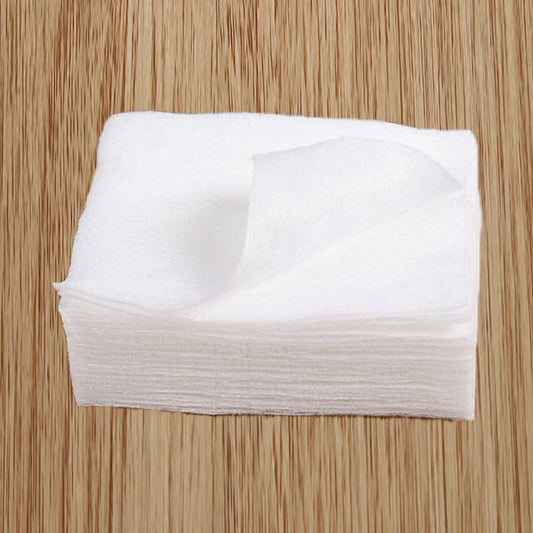 Stack of organic cotton makeup remover pads for gentle and effective cleansing