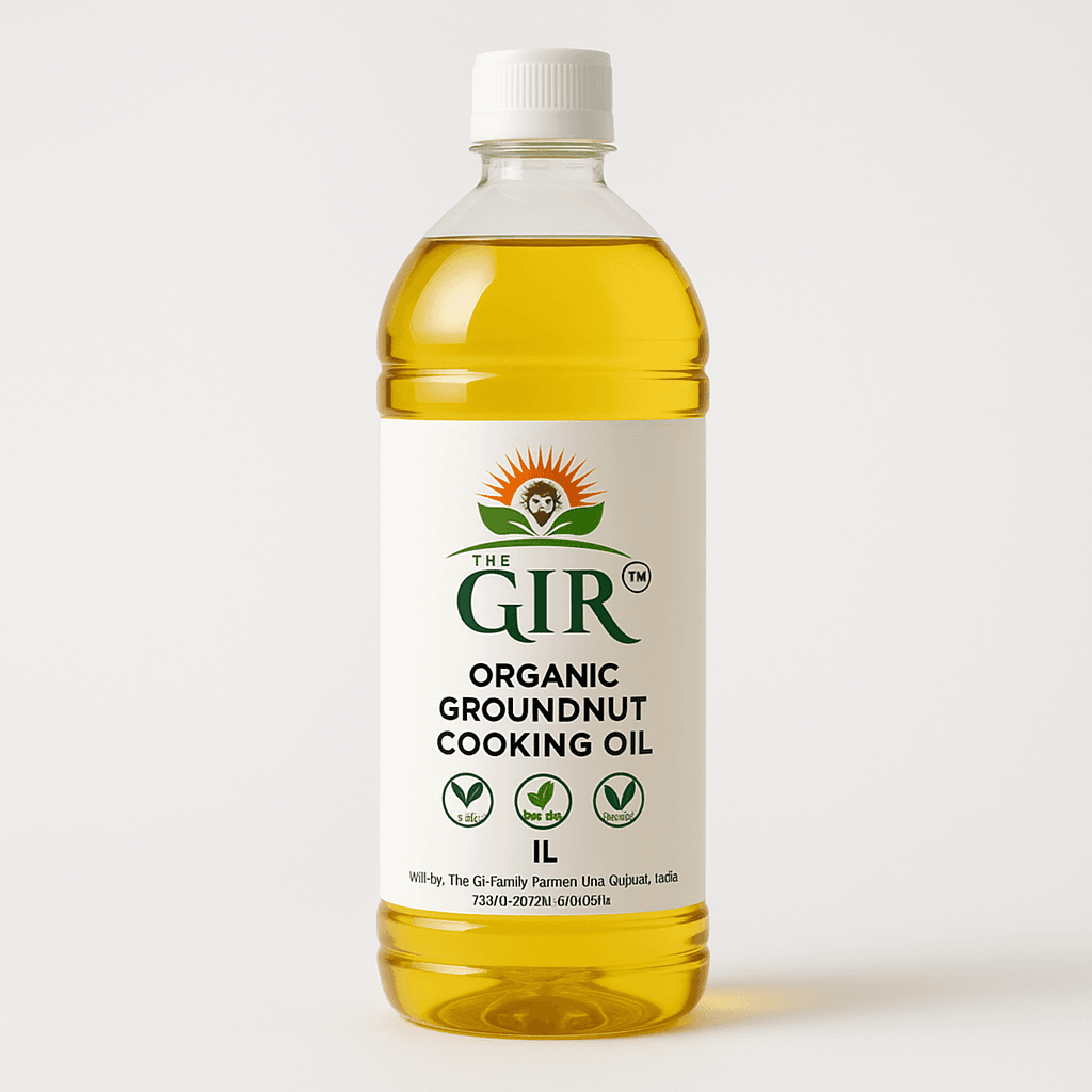 Clear bottle of THE GIR FARMER organic groundnut cooking oil, ideal for healthy cooking and frying