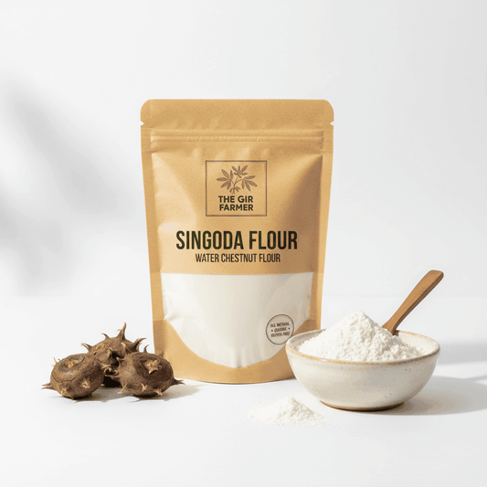 Organic Singoda Flour from The Gir Farmer in a pouch with a bowl of fine flour and water chestnuts
