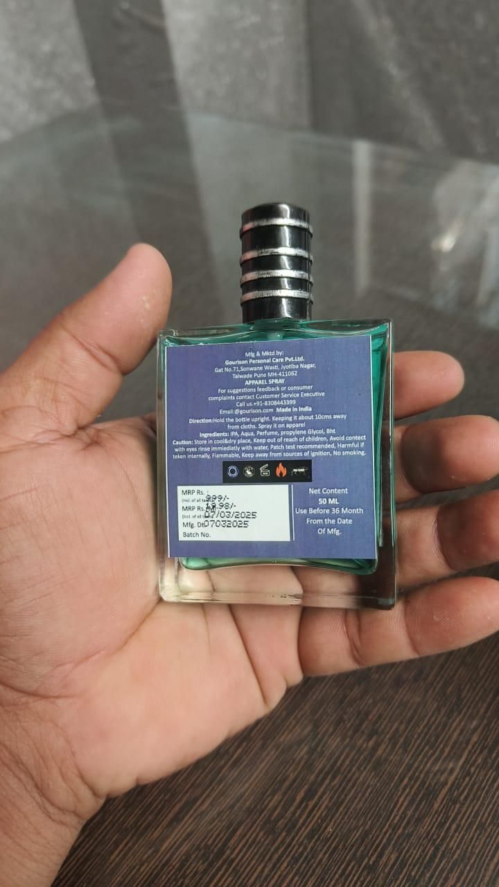Pheromone cologne for men in a stylish bottle held in hand with ingredient details on the back