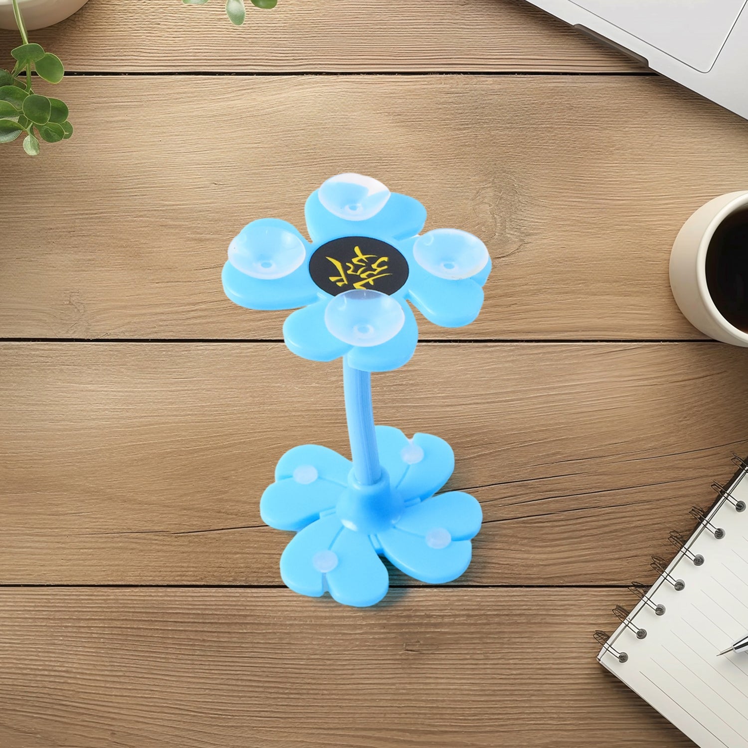 Blue flower-shaped phone holder for car with sturdy base and flexible arms for versatile positioning