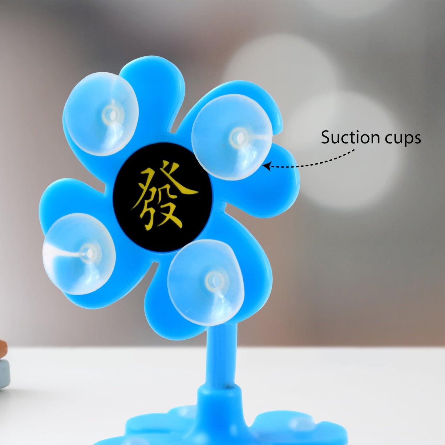 Blue phone holder for car with suction cups for secure mounting on dashboards