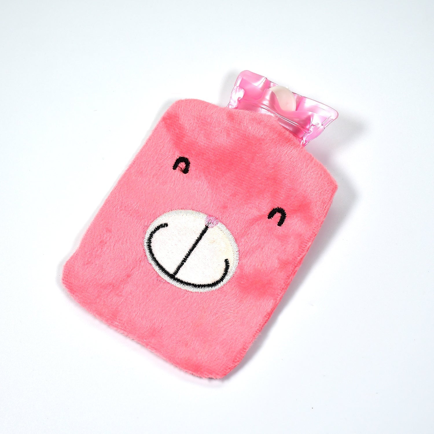 Cute pink hot water bag for cramps with a soft bear design to provide soothing relief