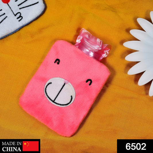 Pink hot water bag for cramps with a cute bear design and soft cover for maximum comfort