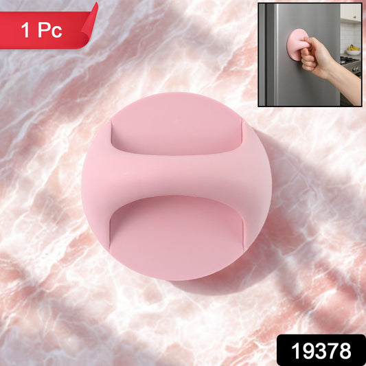 Pink plastic adhesive handle grip designed for easy opening of cabinets and drawers