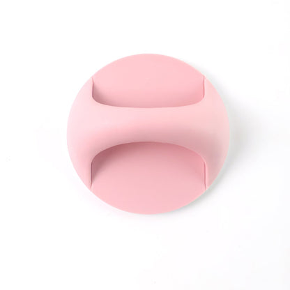 Pink plastic adhesive handle grip for easy and comfortable handling in home improvement projects