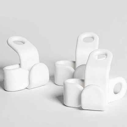 Set of white plastic non-slip clothes hangers designed to keep garments secure and organized