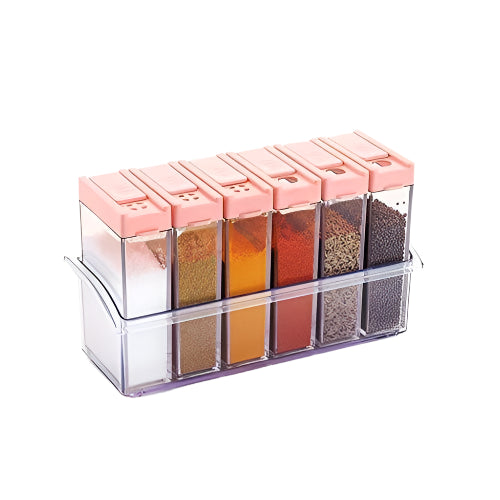 Plastic spice jars set with clear containers and pink lids for organized kitchen storage