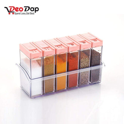Your Brand plastic spice jars set in clear container with pink lids for organized kitchen storage