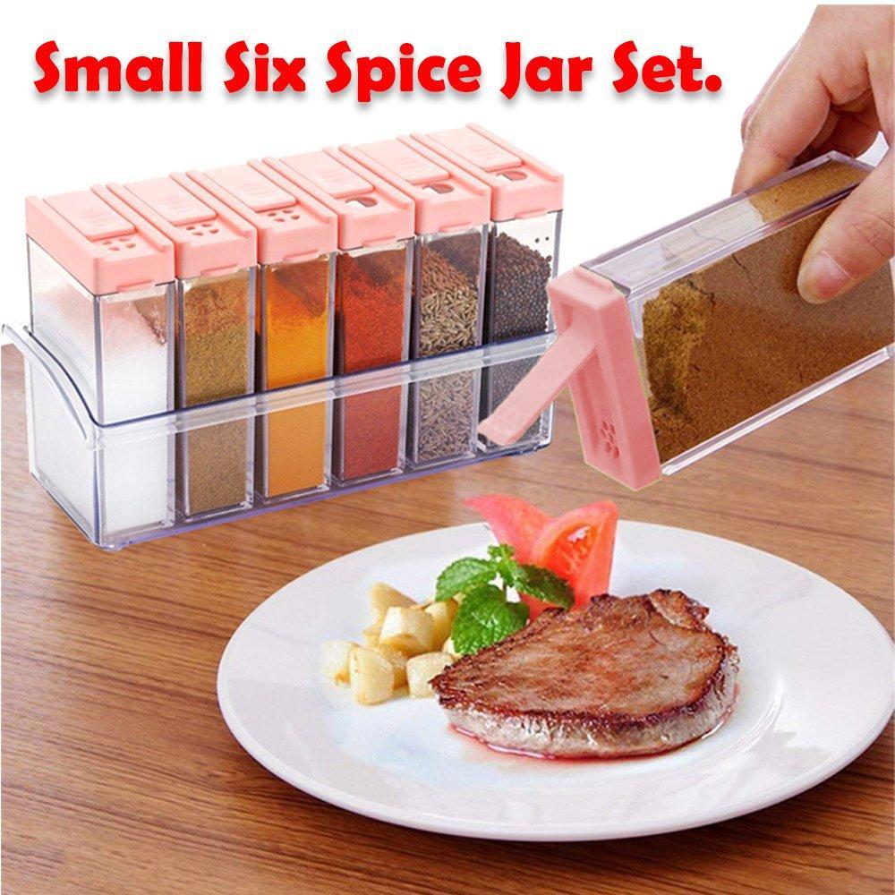 Plastic spice jars set with six small jars for organizing various seasonings on a kitchen countertop
