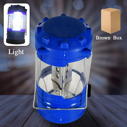 Portable camping lantern waterproof in blue with a clear glass body for outdoor adventures
