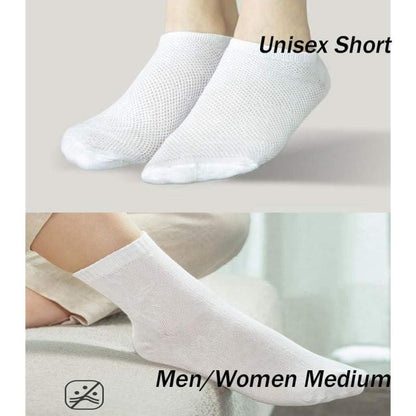 Portable disposable travel socks in white, ideal for men and women, featuring a unisex short design