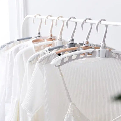 Portable folding clothes hanger with multiple hooks for space-saving laundry organization