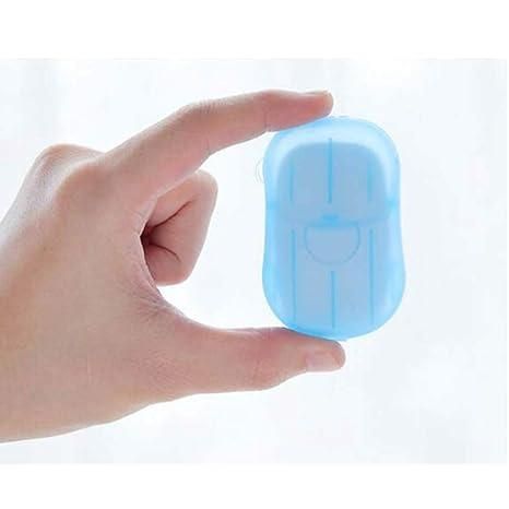 Hand holding a portable scented paper soap for convenient and fragrant handwashing on the go