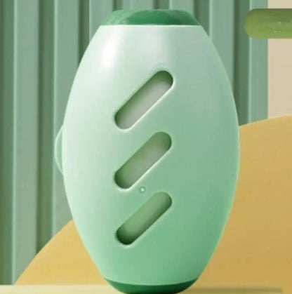Portable silicone lint roller in green color designed for easy cleaning and travel convenience