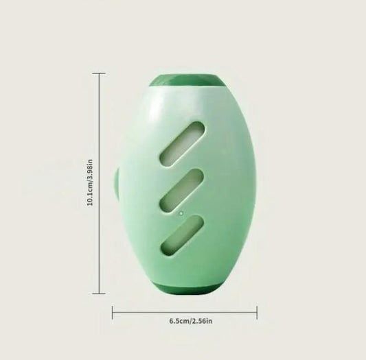 Compact portable silicone lint roller in green with ergonomic design and measuring 10cm tall